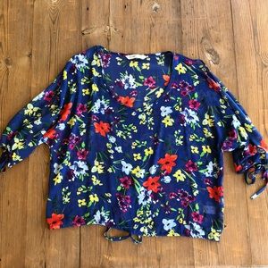 Cute sheer top with cut out arms